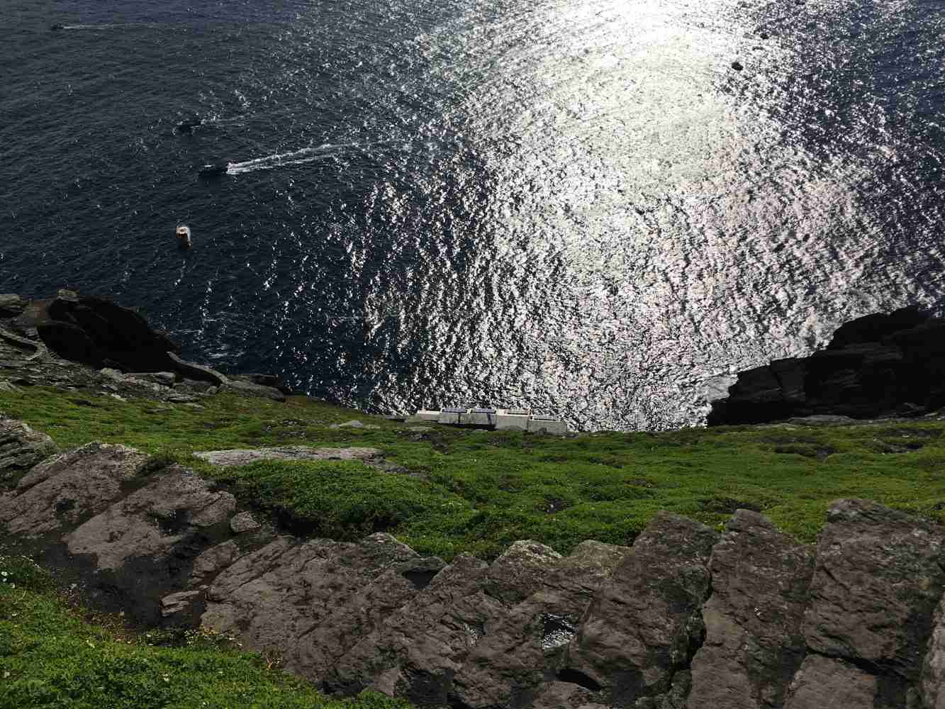 The History of Skellig Michael: A Journey from Ancient Monks to Star Wars Skellig Michael cliffs looking down towards the pier (Star Wars filming location)